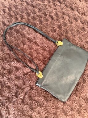 Sleek Black Leather Shoulder Bag with Gold Hardware